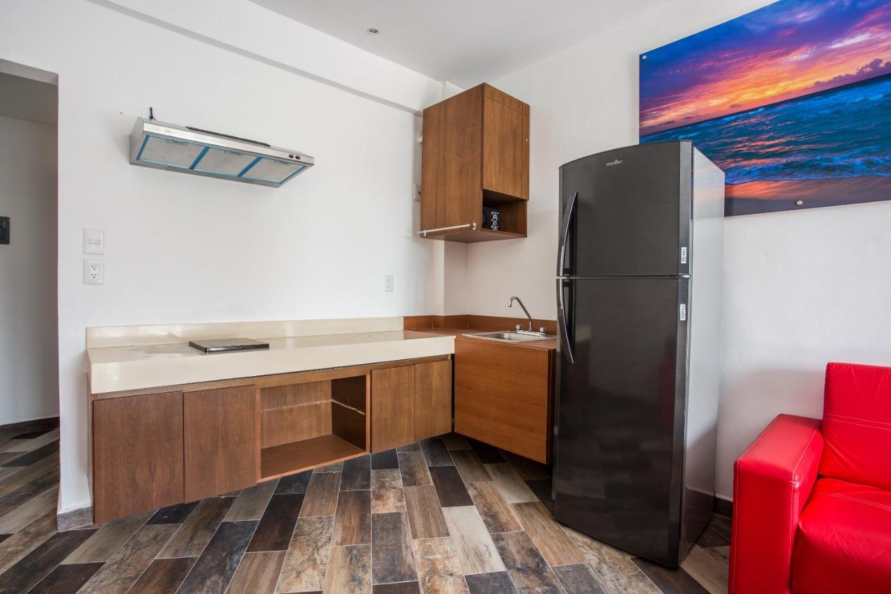 Capital O Cancun Ocean View, Cancún Eksteriør billede A typical kitchen in a studio apartment